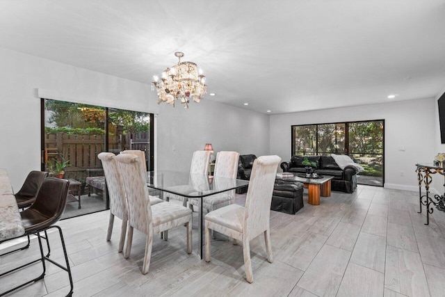 dining area featuring a chandelier