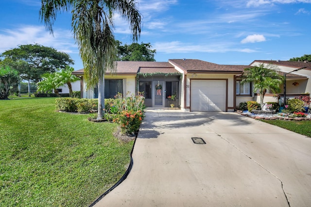 ranch-style home featuring a front yard and a garage