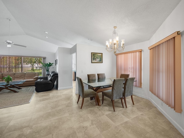 dining room featuring ceiling fan with notable chandelier, vaulted ceiling, and a textured ceiling