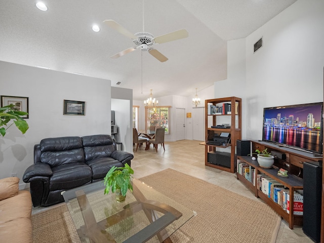 living room featuring ceiling fan with notable chandelier and high vaulted ceiling