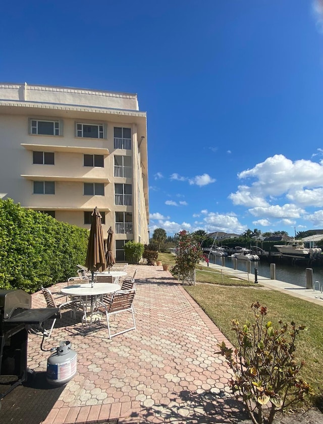 view of home's community with a water view