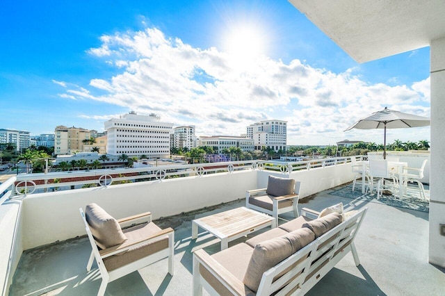 view of patio with a balcony