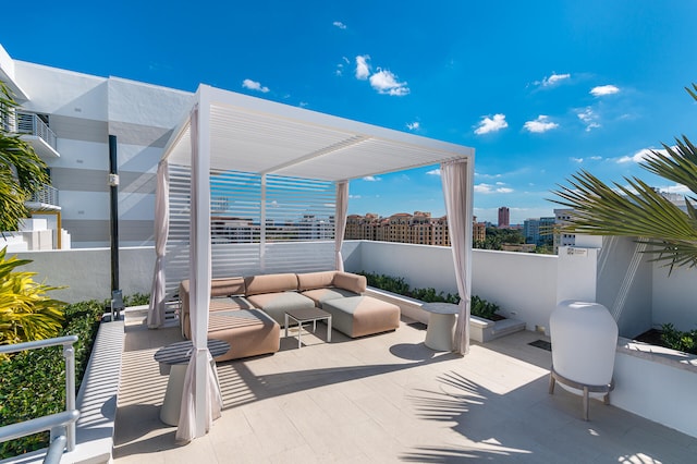 view of patio / terrace featuring a pergola and outdoor lounge area