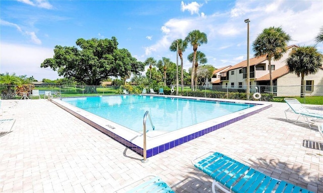 view of pool featuring a patio area