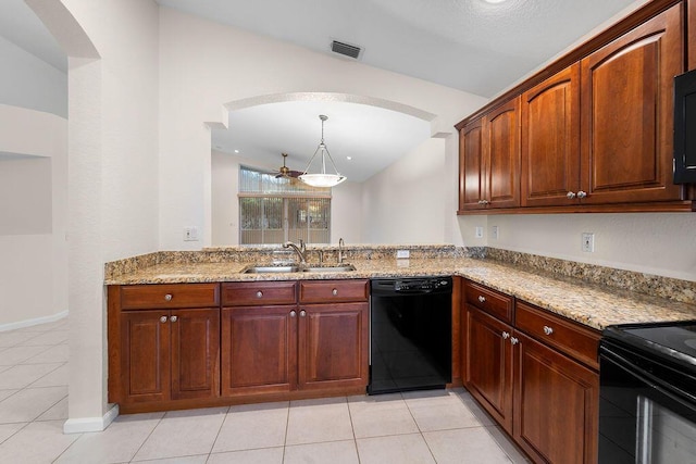 kitchen featuring light stone countertops, sink, lofted ceiling, light tile patterned floors, and black appliances