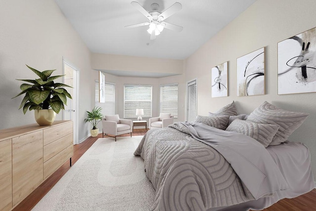 bedroom featuring ceiling fan and hardwood / wood-style flooring