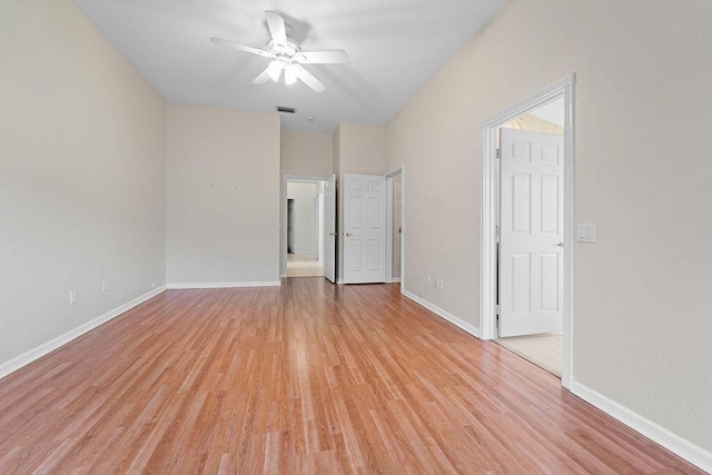 unfurnished room featuring ceiling fan and light hardwood / wood-style flooring