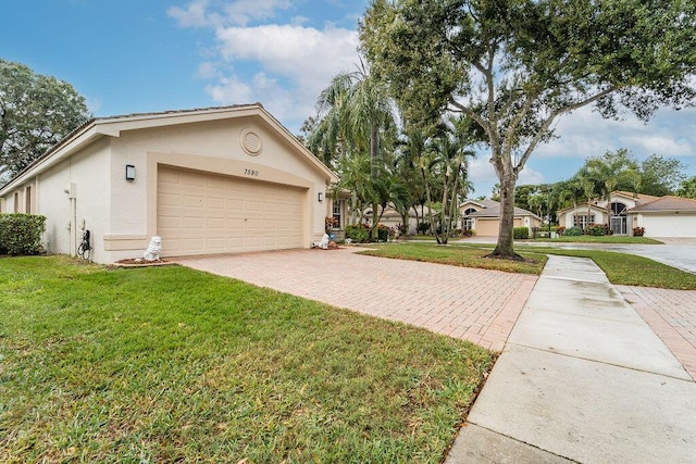 view of side of home with a garage and a lawn