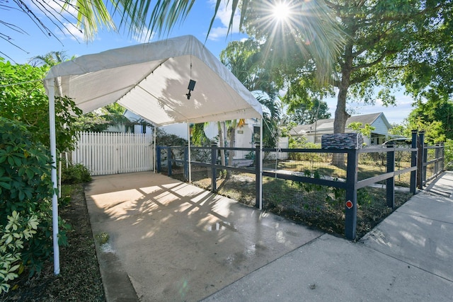 726 N E St, Lake Worth Beach, FL 33460 - view of patio / terrace featuring a gate and a fenced front yard