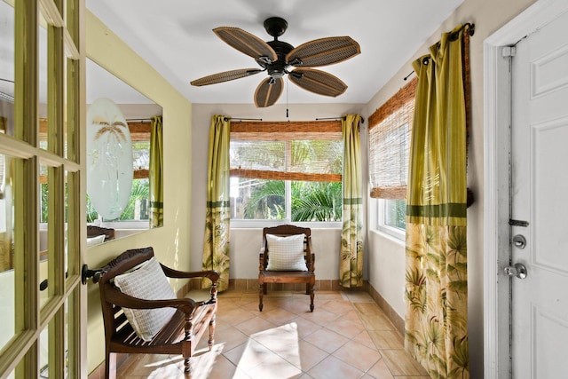 sunroom / solarium with ceiling fan