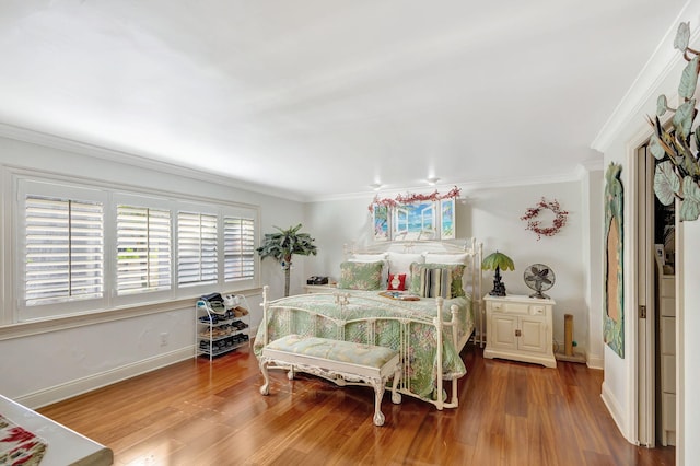 bedroom featuring wood-type flooring and ornamental molding