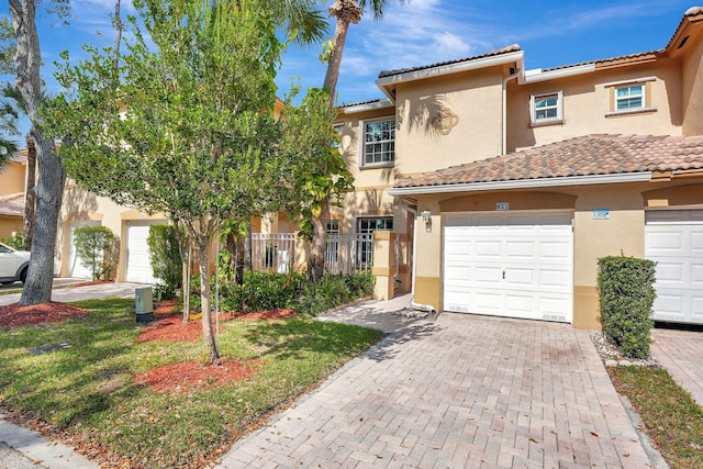 view of front of property featuring a garage