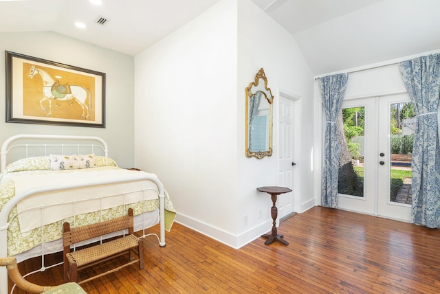 bedroom featuring lofted ceiling, access to exterior, wood-type flooring, and french doors