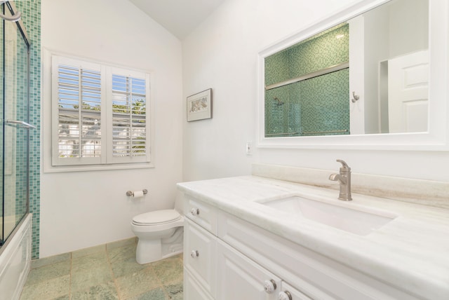 full bathroom featuring vanity, enclosed tub / shower combo, vaulted ceiling, and toilet