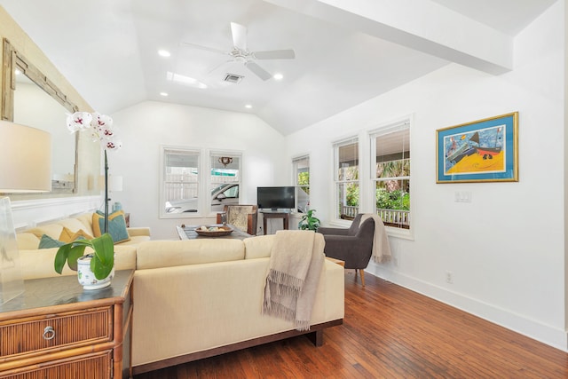 living room featuring ceiling fan, plenty of natural light, dark wood-type flooring, and vaulted ceiling