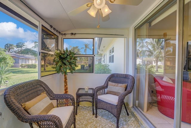 sunroom / solarium with ceiling fan and a healthy amount of sunlight