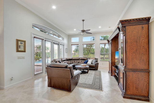 tiled living room featuring crown molding and ceiling fan