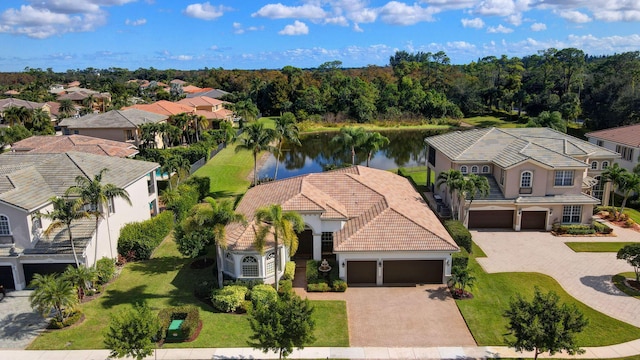 drone / aerial view with a water view