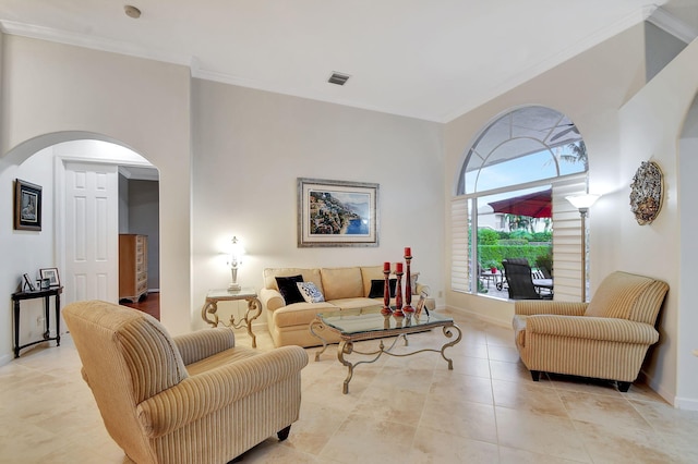 tiled living room featuring crown molding