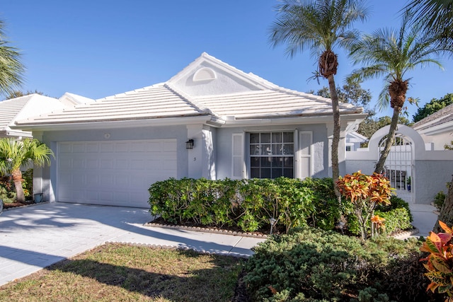 single story home featuring a garage