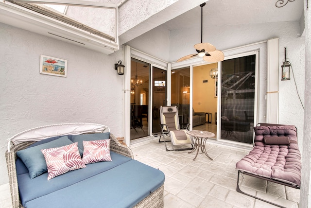 view of patio featuring ceiling fan