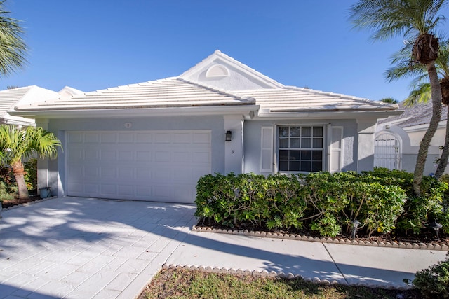 single story home with a garage