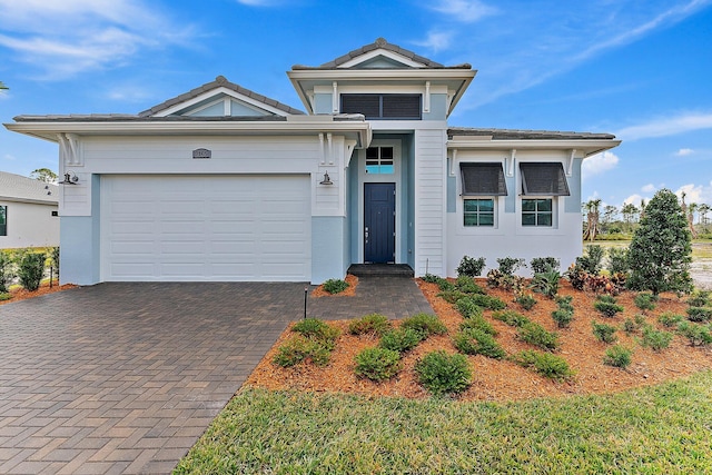 view of front of property featuring a garage