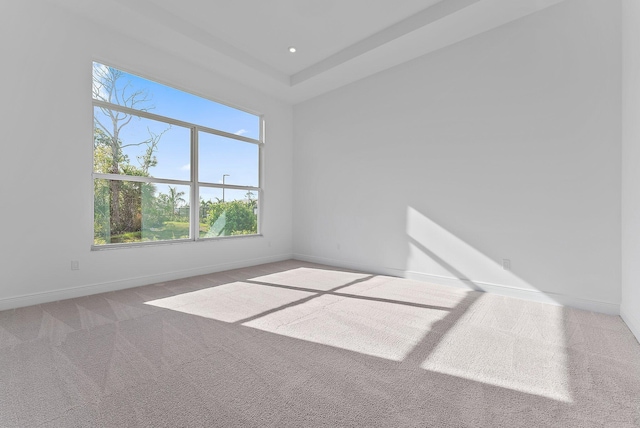 empty room featuring carpet flooring