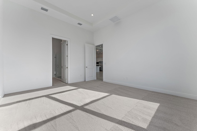 unfurnished bedroom with light carpet