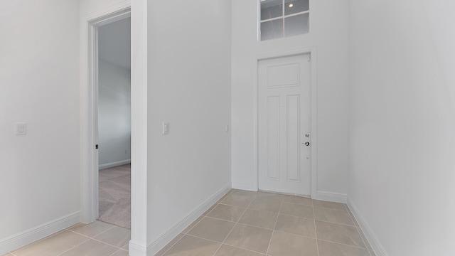 interior space with light tile patterned floors