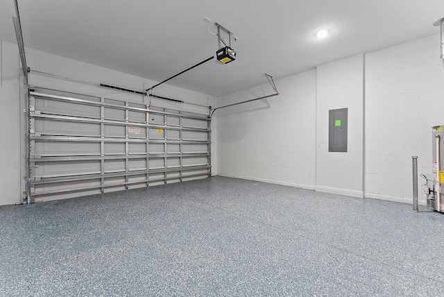 garage featuring electric panel and a garage door opener