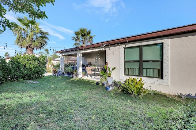 view of yard featuring a patio