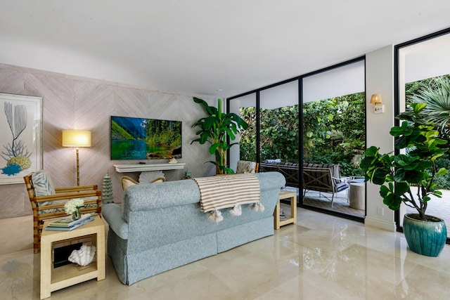 living room with floor to ceiling windows