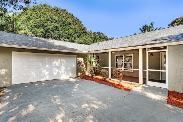 single story home featuring a garage