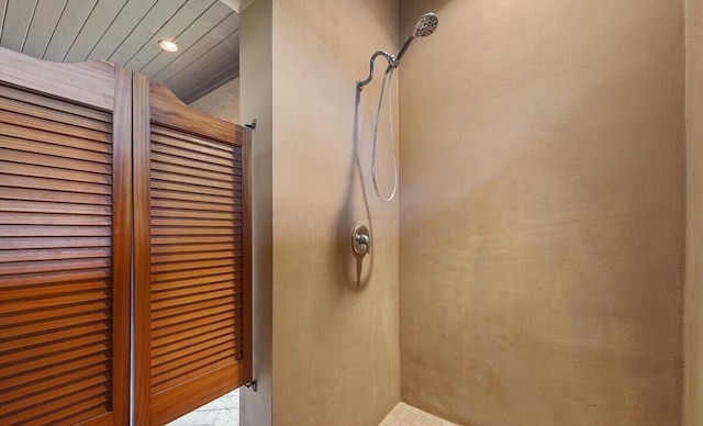 bathroom featuring tile patterned flooring and walk in shower