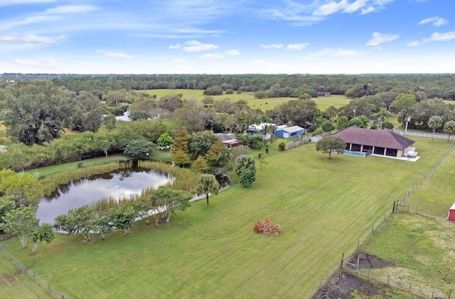 birds eye view of property with a water view and a rural view