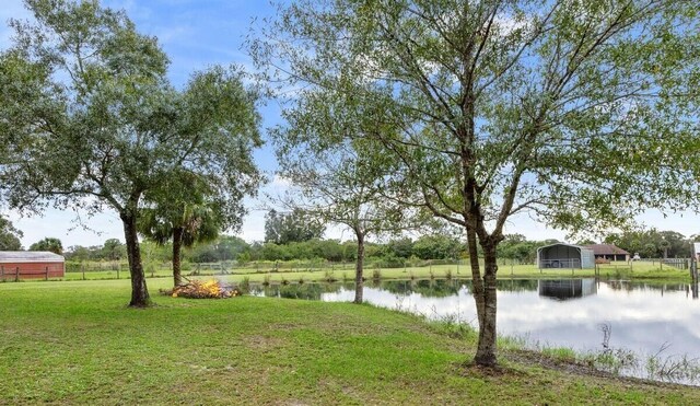 view of yard with a water view