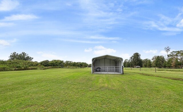 view of yard with a carport