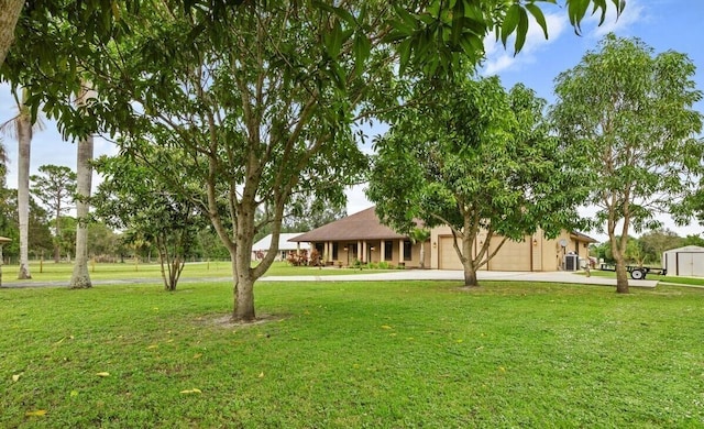 view of yard with a garage