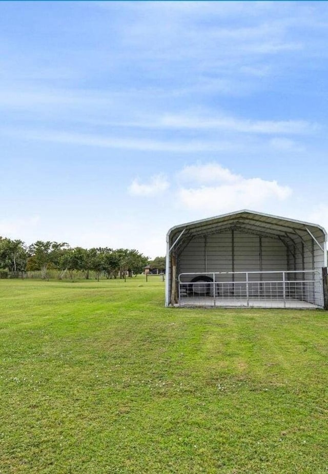 view of yard with a carport