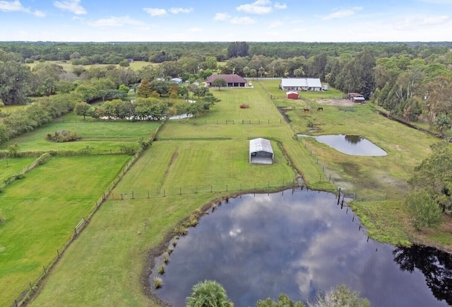 drone / aerial view with a rural view and a water view