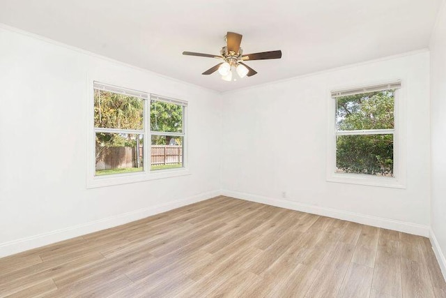 6312 Garden Ave, West Palm Beach, FL 33405 - unfurnished room with baseboards, light wood-style flooring, crown molding, and ceiling fan