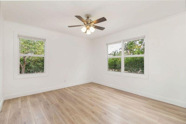 6312 Garden Ave, West Palm Beach, FL 33405 - empty room featuring light wood-style floors, baseboards, and a ceiling fan