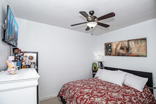 bedroom featuring ceiling fan