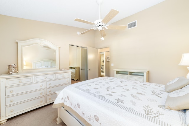 carpeted bedroom with a closet and ceiling fan