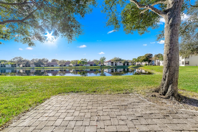 view of patio featuring a water view