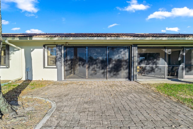 back of house featuring a patio