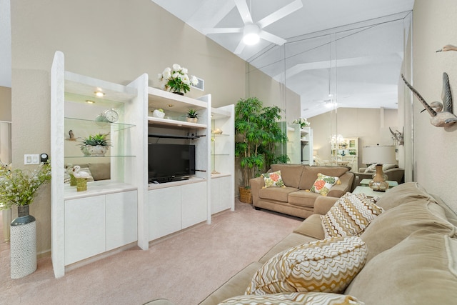 carpeted living room featuring ceiling fan and high vaulted ceiling