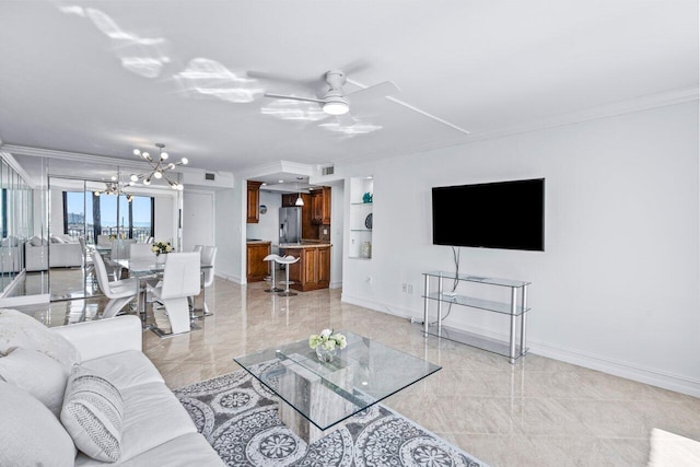 living room with ceiling fan with notable chandelier and ornamental molding