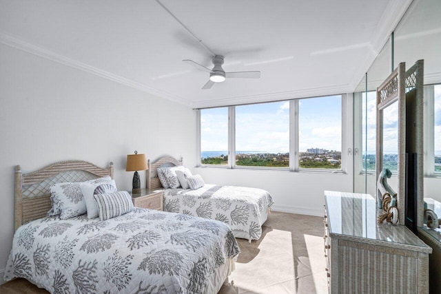 bedroom featuring ceiling fan and ornamental molding